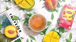 Our NEW Lipton Peach Mango Herbal Tea is like being in a tropical paradise during midst of winter. That’s what juicy peach and mango flavors will do to you. See where your senses take you. | Lipton