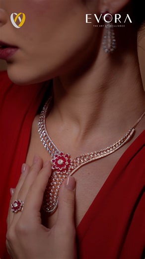 A touch of red, a dance of curves—Evora transforms daring shapes into jewellery that speaks of passion, power, and timeless grace. #joyalukkas #EvoraCollectionbyJoyalukkas #EvoraCollection #ModernElegance #FluidDiamonds | Joyalukkas