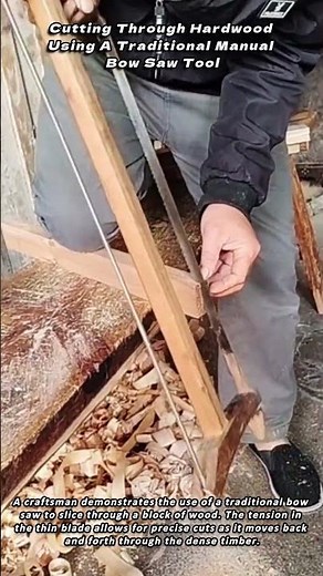 Cutting Through Hardwood Using A Traditional Manual Bow Saw Tool