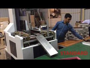 Rigid box making machine