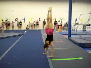 Guinness World Record for the Most Consecutive Handstand Pirouettes (30)