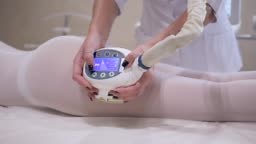 massage and care for women's body in the beauty salon, female client...