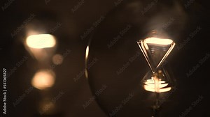 Retro light bulb slowly lights up and goes out. Concept: electricity, green energy, electricity prices