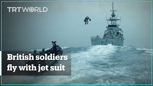 381K views · 11K reactions | British mariners fly like "Iron Man" as they test a jet suit developed by Gravity Industries off the south coast of the UK. | TRT World | Facebook