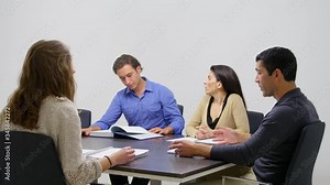MS Four people meeting at conference table