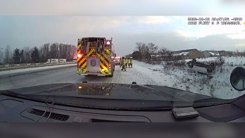 Out-of-control truck jackknifes first responder vehicles on icy highway in Michigan