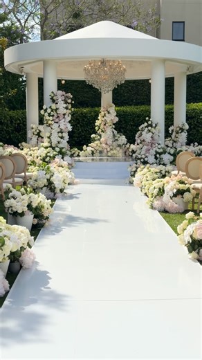 Luxury Wedding & Event Planner on Instagram: "The Ceremony 🤍 Wedding Planner/Stylist & Management- @eventsbyjosiegittany Venue- @miramaregardens Videography & Photography- @nycfilms_and_photography Content Creator- @socialsbyjoshjoseph Florals- @montana__flora Flooring- @elite.dancefloors Chandelier- @starlightchandeliers Celebrant- @semakelescelebrant Entertainment- @cardisviolin @jacobhacklany Auditioned- @jayproductionsevents Decor Hire Items- @whitelabelhire Pyrotechnics- @sydney_fireworks_