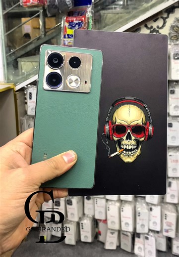 Infinx Note 40 wrapped in skeleton with Cigarette 💀☠️ 📍 SHOP ADDRESS: Go Branded – Shop No. G1, Basement Civic Mobile Tower, Arts School Road Quetta ✨ 🛒 DM for order #mobilewrap #gobrandedofficial #viral #quetta #3d