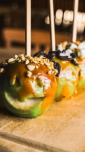 Boo-tiful bites await 👻🍎 Turn apples into frightful fun at this caramel apple snack bar. | Price Chopper