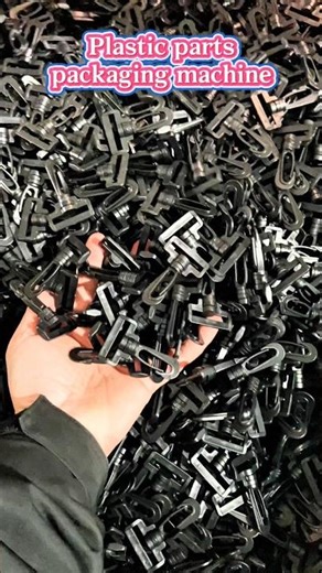 Plastic parts packaging machine.#packagingmachine #factory #plasticparts