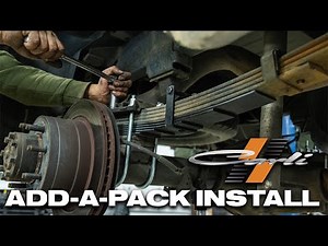 Installing Carli's 1" rear lift progressive 5-leaf add-a-pack springs on a 2004 Ram 2500