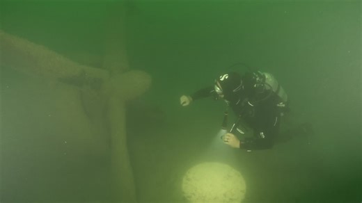 Divers explore rare WWII aircraft preserved in Arizona lake since 1948