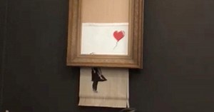 Banksy artwork self-destructs after $1.4M sale