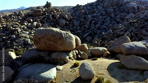 Rising drone shot of the large rocks in Boulder Gardens, California.