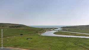Cuckmere haven valley river drone SUP, stand up paddle board, cows, countryside, Sussex, Seaford, trail, ocean, cliffs, sunny day