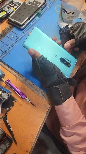 One plus 8 pro back glass remvo#smartphone #repair #youtubeshorts #viral