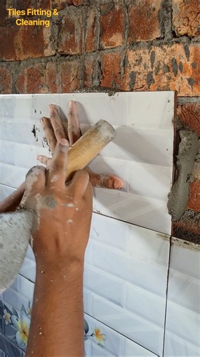 I installed new-design white tiles on the bathroom walls.#walltiles #whitetiles #tilesfitting