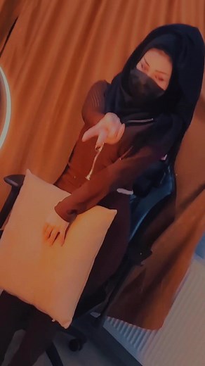 Cozy Indoor Moments with a Brown Outfit and Pillow