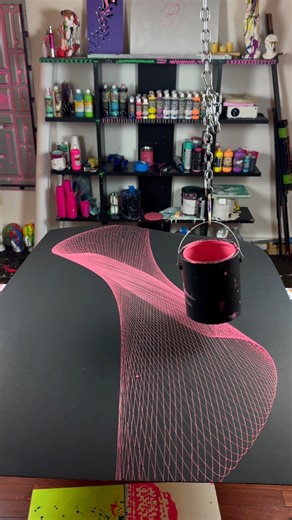 113K views · 1.5K reactions | A single swing of the pendulum transforms into flowing red geometry across the canvas. Guided by gravity, inertia, and rhythm, every line is unique — never repeatable, never the same twice. This is science and art colliding in real time.  Follow for more pendulum paintings and acrylic pouring videos. #diyart #pendulumpainting #artandscience | Jake Boldt | Facebook