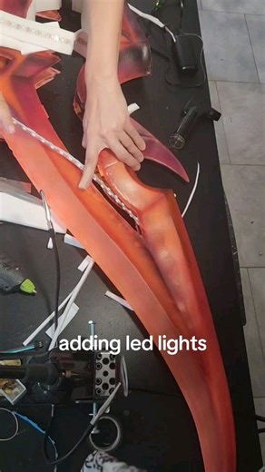 21K views · 505 reactions | Trying out some led strips in my Fyr'alath axe from warcraft. Blade is a hollow 3dprint, brushed with epoxy resin inside and out. #cosplay | Willow Creative | Facebook