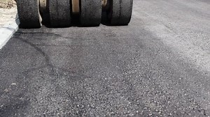 clip-18128122-paving-machine-asphalt-bitumen-road