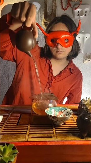 In the red mask, I brew tea by the lights of night #chinesetea #teaceremony #teadrinking #tealover