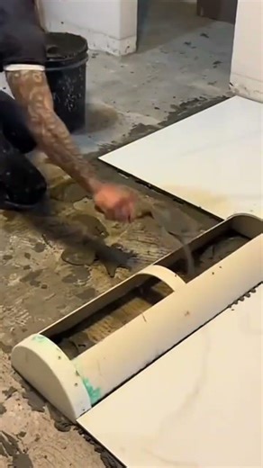The process of installing a ceramic on the building area by a craftsman