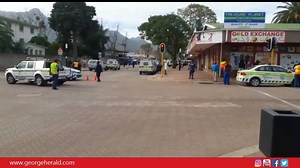 8.5K views · 45 reactions | VIDEO - Both sides of the taxi rank in the CBD has been closed-off by police and traffic officials. Rubber bullets and stun grenades were fired. | George Herald | Facebook