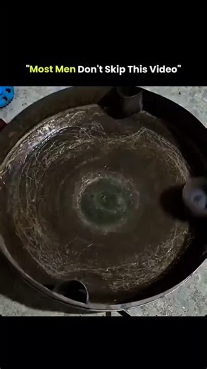 History | Entertainment | News on Instagram: "The post features a 24-second video showing a man pouring petrol into a large metal container, dropping several steel bearings inside, and using a power drill to spin them at extreme speed until repeated metal-on-metal collisions generate visible sparks that ignite the fuel vapors, causing a sudden fire inside the container. The clip functions as a raw demonstration of ignition physics rather than spectacle, illustrating how high-speed friction and i