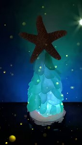 Today’s Dollar Tree craft was made using a prelit plastic Christmas tree(see photo in comments). I cut a hole in the base of a 4” wood round to fit the base of the tree to make it sturdier, then used my glue gun to adhere layers of sea glass to it. Topped it with a starfish, and it’s ready to display. The on/off switch is on the bottom for easy access. The tree stands 6” tall without the star. | LC's Glass