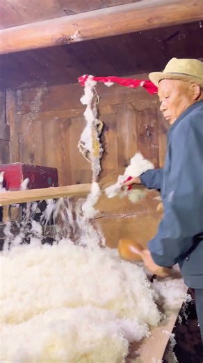 Traditional Craft: Fluffing Cotton Fiber with a String Bow Tool