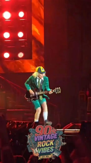 Angus Young’s legendary duckwalk! #acdc #angusyoung #concert #90s #vintagerock