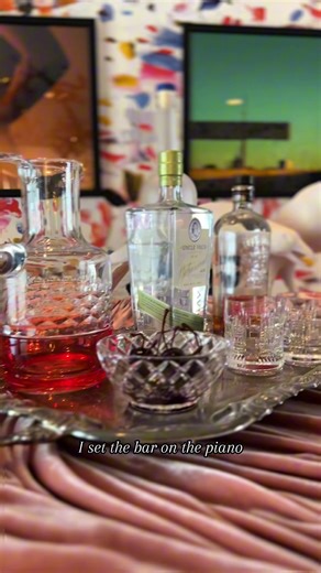 What do you get when you set your drinks on a piano? A piano bar. #interiordesign #bar #drinks #hosting #piano @Grey Goose