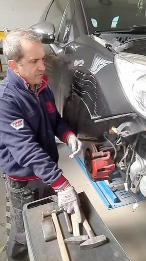 Car Modification and Repair Process in Action