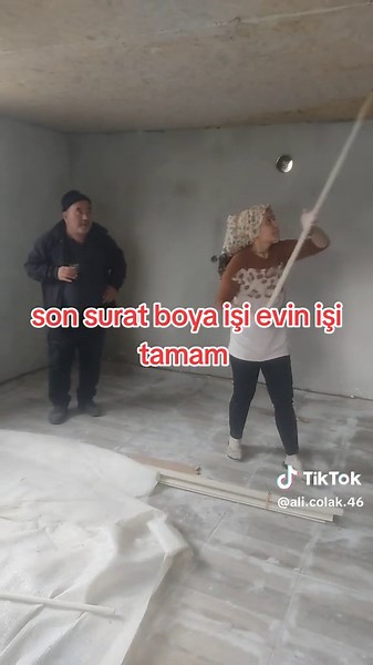 Construction Project in Progress: Two Individuals Working