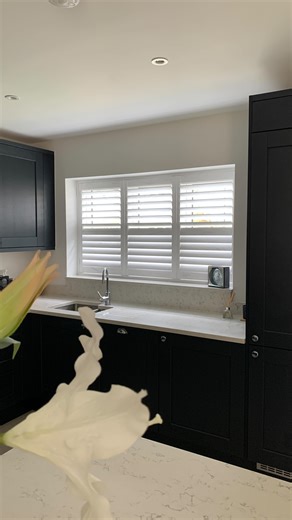 Before ➝ after. A simple change that makes a big difference. Full height shutters with split operation installed in this kitchen, giving flexible light control, privacy where needed, and a clean, fitted finish that suits the space perfectly. #kitchenshutters #fullheightshutters #splitoperationshutters #plantationshutters #emshutters | EM Shutters