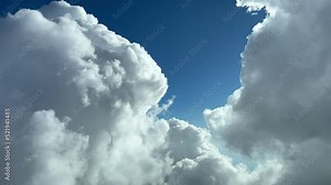 Stunning aerial view from a jet cockpit avoiding some good weather cumulus during the climb. Pilot point of view. 4K 60 FPS.