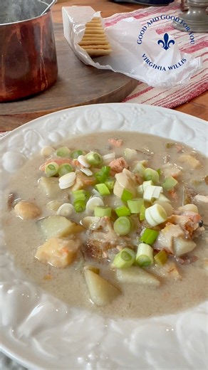 Healthy Fish Chowder -serves 4 2 slices thick-cut bacon cut into strips 1 sweet onion chopped 2 stalks celery chopped 2 garlic cloves chopped 2 tablespoons unbleached all-purpose flour 1 cup skim milk 1 quart reduced fat low sodium chicken stock 1/2 teaspoon Old Bay 4 russet potatoes cut into ½-inch cubes 1 pound firm white fish such as pollack or cod, cubed 4 green onions chopped, for garnish Coarse kosher salt and freshly ground pepper Heat a large pot over medium heat. Add the bacon. Cook unt