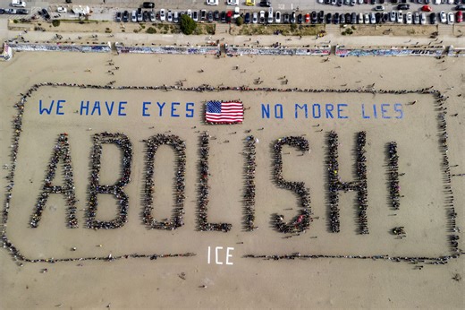 Photos: Thousands of S.F. protesters form banner with message for ICE