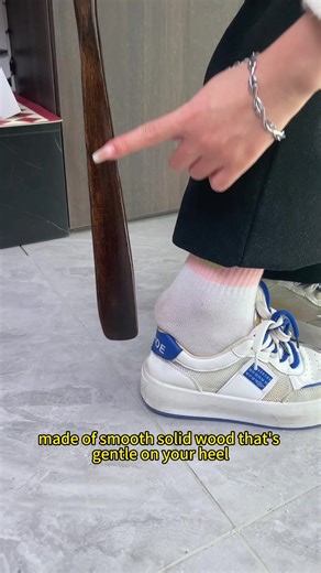 No more struggling with tight shoes! This wooden shoe horn saves your heels