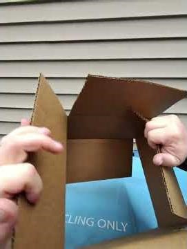 Breaking down cardboard boxes in Chicago & blue bin recycling
