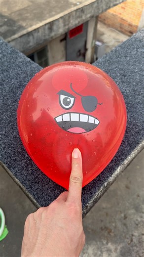 Experiment: Will a water balloon explode if it rolls down a tall building? 💥🎈#shorts