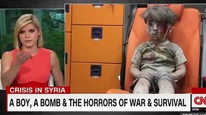 CNN anchor tears over injured Syrian boy