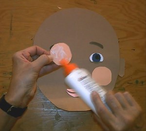 Self-Portrait Collage, 4. Glue the Facial Features
