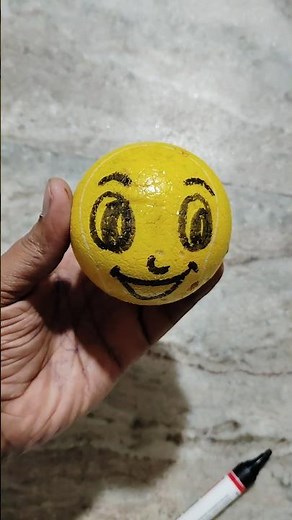 drawing a happy face on a ball ⚽#shorts