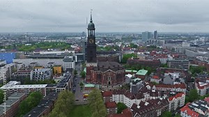 Drone shot of St. Michael's Church ( Hauptkirche St. Michaelis ) Hamburg , Germany . it is a landmark of the city and it is considered to be one of the finest Hanseatic Protestant baroque churches.