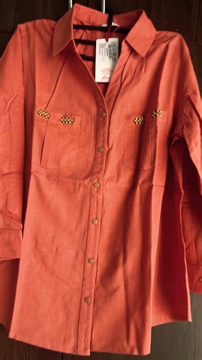Pure cotton women shirt in rust color with beads work on pockets