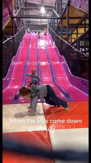 Epic Water Slide Fails: Dad's Hilarious Tackle!