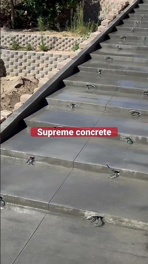 Concrete stairs with cheek walls and lights