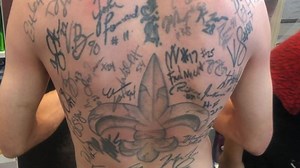 Saints fanatic adds ultimate autograph to unique collection